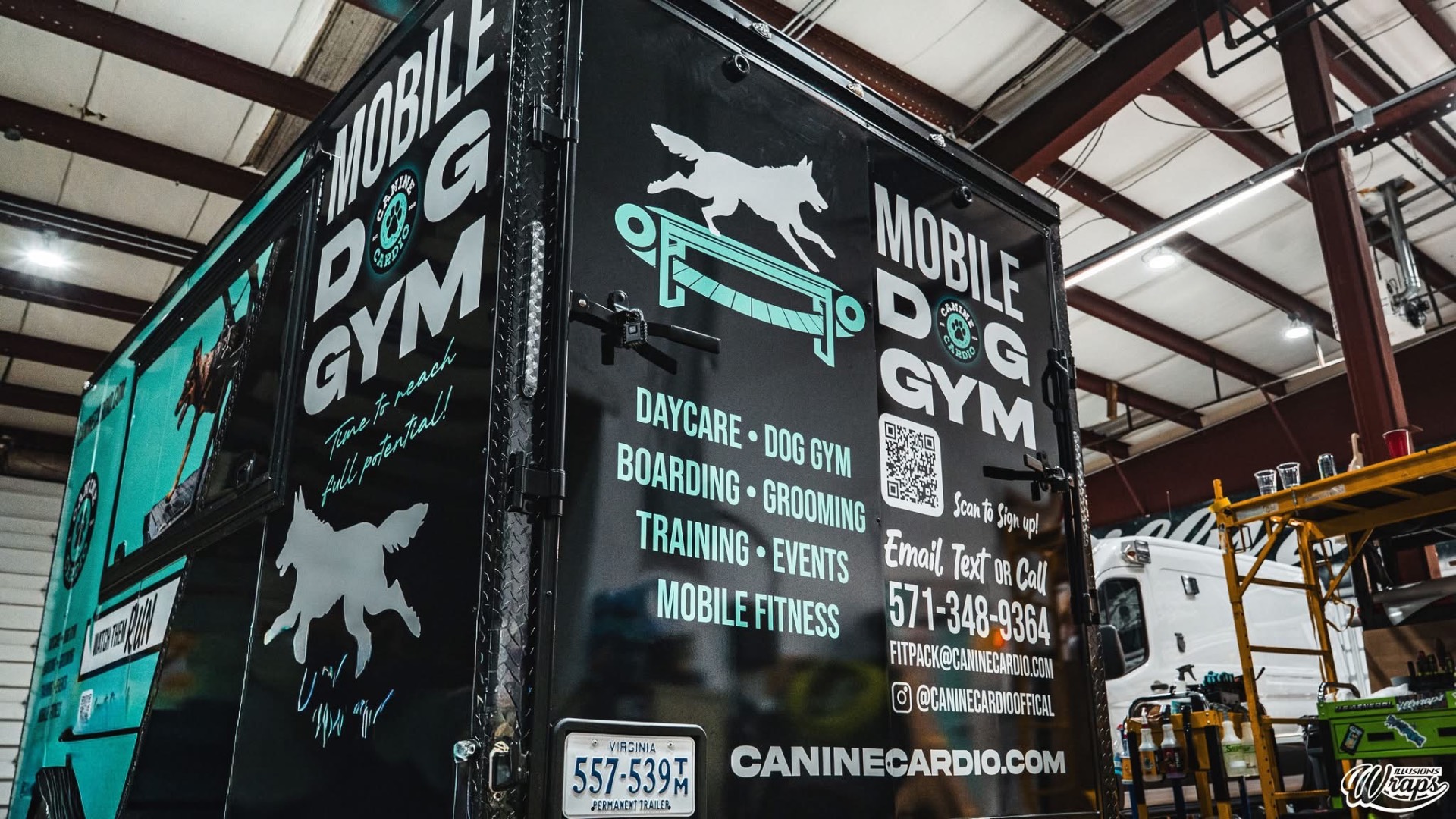 Mobile Dog Gym trailer — service list and contact panel