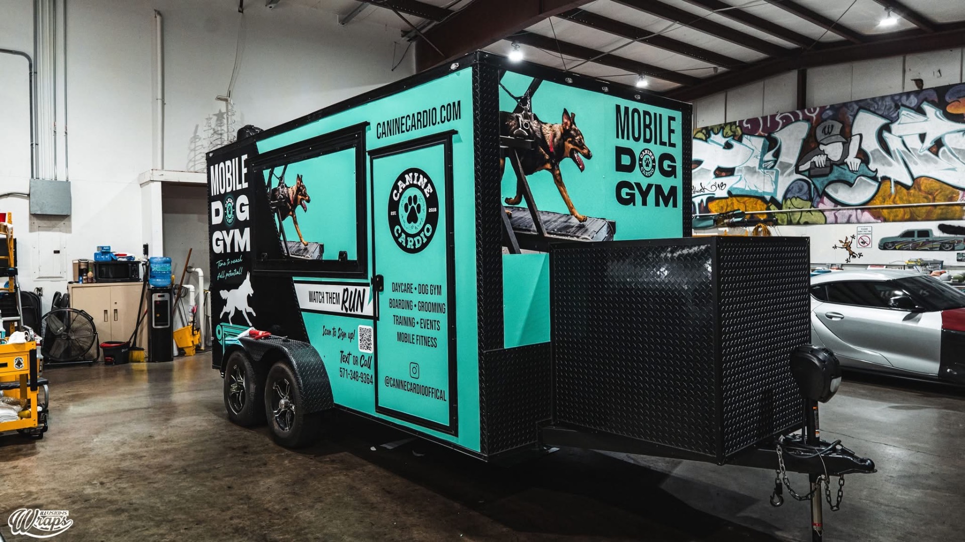 Mobile Dog Gym trailer — rear three-quarter view
